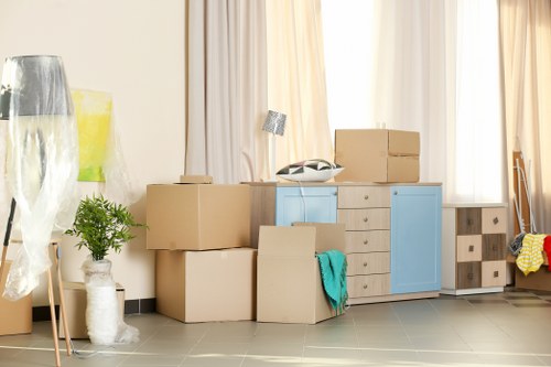 House removal team loading furniture in West Hampstead