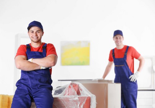 Office relocation planning in West Hampstead with desks and moving boxes