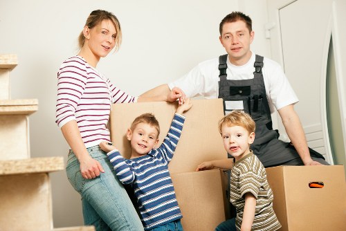 Preparation checklist and packed boxes for a flat move in West Hampstead
