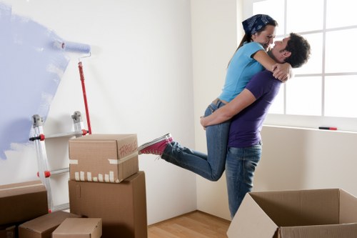 Local furniture pick-up service handling apartment access in West Hampstead