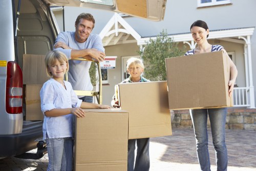 Loading household items into a removal van