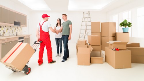 Loading boxes and household items into a moving van