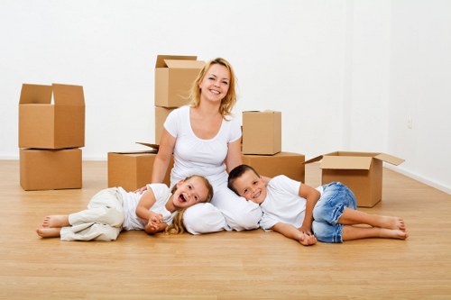 Loading household items into a van near West Hampstead