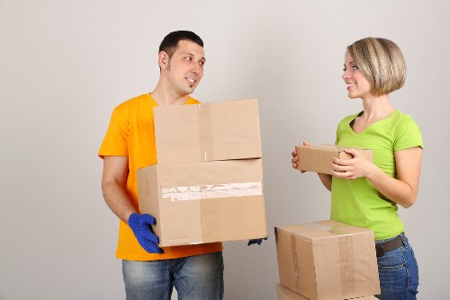 Boxes and household items being organised for urgent removals