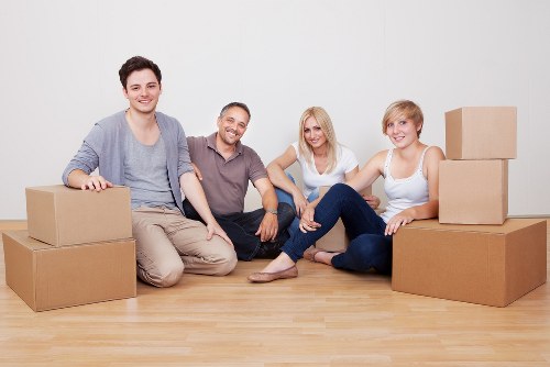 Securely packed moving van with protective wrapping and straps