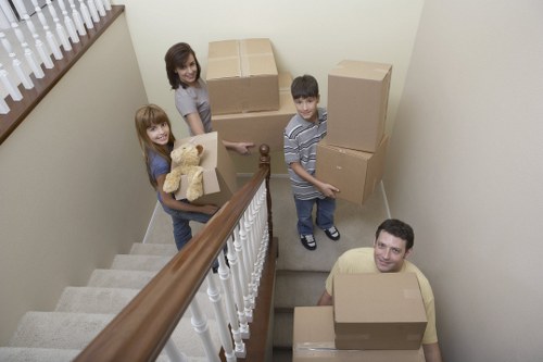 Trained movers using safe handling techniques in West Hampstead